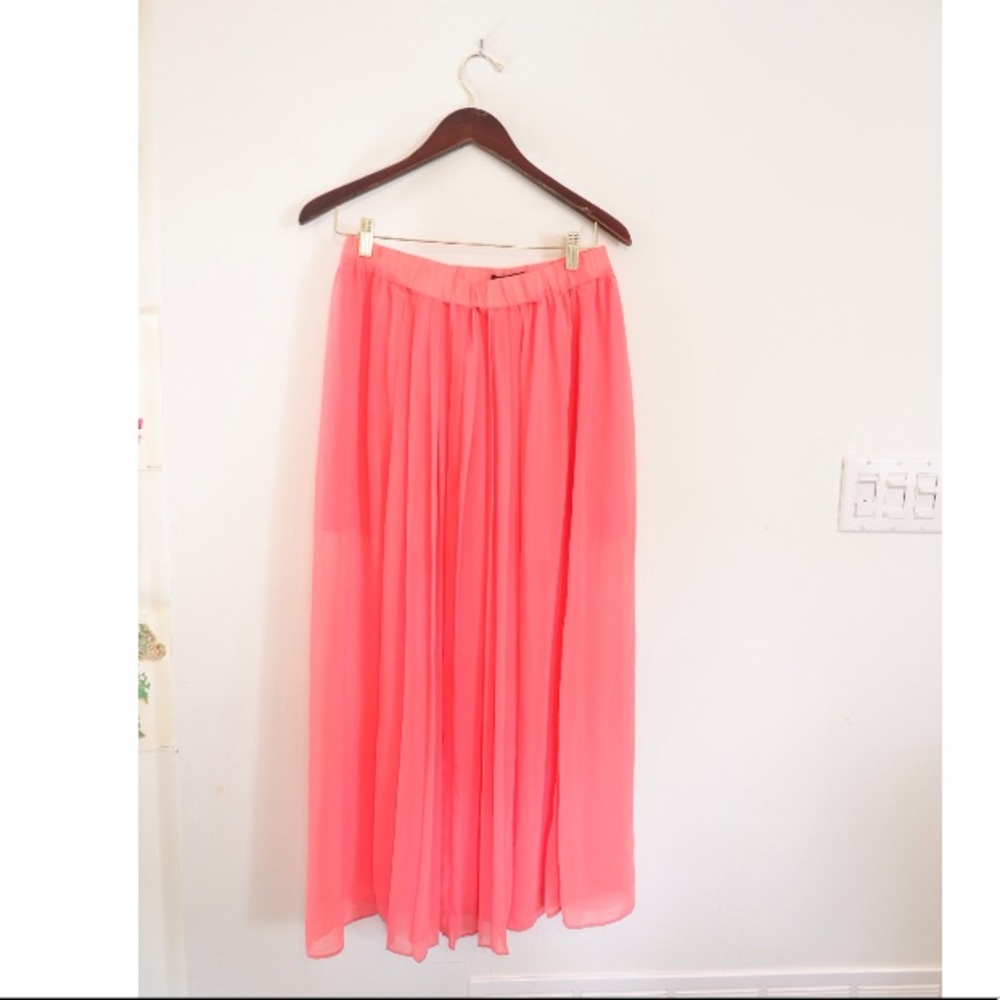 Long coral pleated maxi skirt